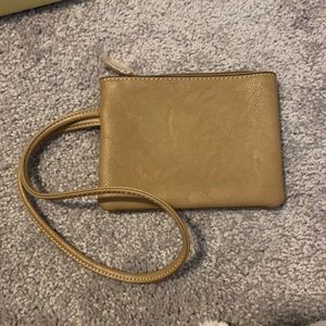 Small brown wristlet bag